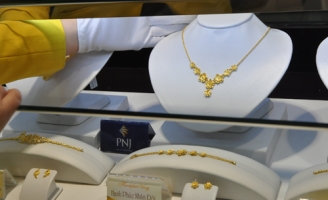 Giá vàng miếng giảm, USD tăng