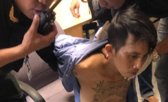 Mang súng vào sân bay Tân Sơn Nhất, gã xăm hình rồng bị an ninh quật ngã