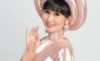  NSUT Tâm Tâm đắm say trong Áo dài của NTK Việt Hùng
